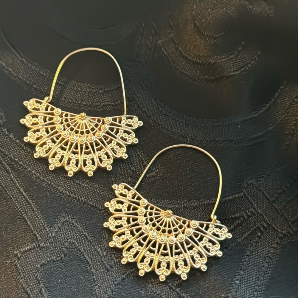 Gold tone, half medallion earrings filigree